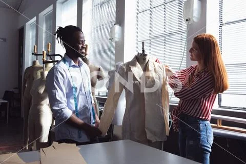 Young students working on a project at a fashion college Stock Photos