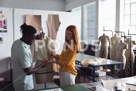 Young students working on a project at a fashion college Stock Photos