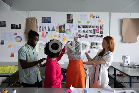 Young students working on a project at a fashion college Stock Photos