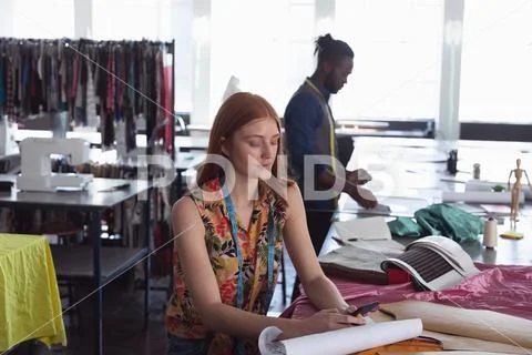 Young students working on projects at a fashion college Stock Photos