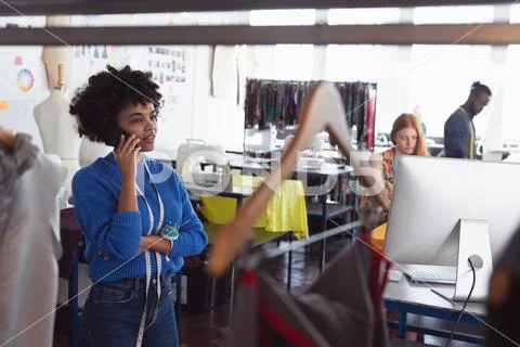 Young students working on projects at a fashion college Stock Photos