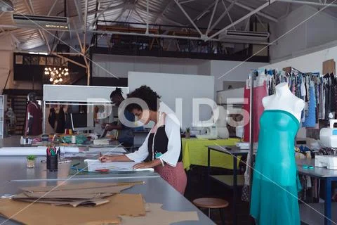 Young students working on projects at a fashion college Stock Photos