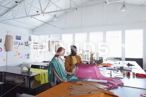 Young students working on projects at a fashion college Stock Photos