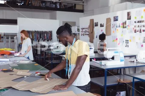 Young students working on projects at a fashion college Stock Photos