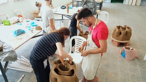 Young students working on a sculpture at the 12th International Eskisehir Terra Stock Footage 104032226