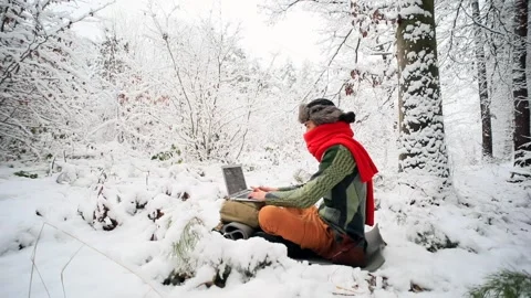 Young stylish crazy user man using laptop computer enjoying beautiful winter Stock Footage 166829276