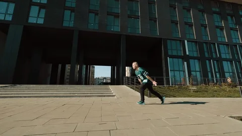 Young Stylish Dancer Makes Jump. Vídeos de archivo 119893112