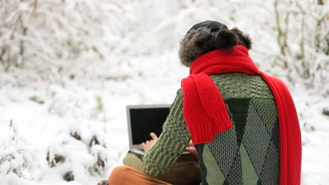 Young stylish freelance man using laptop computer enjoying beautiful winter 스톡 동영상 166829463