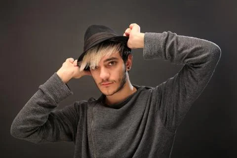 Young stylish man with hat Stock Photos