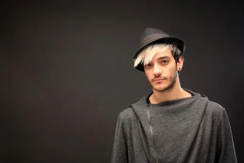Young stylish man with hat Stock Photos