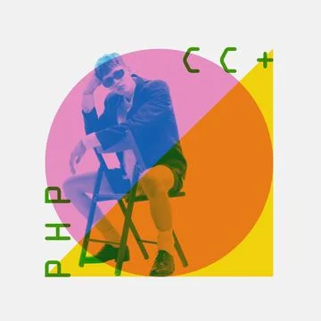Young stylish man in sunglasses, programmer working, writing code for website Stock Photos