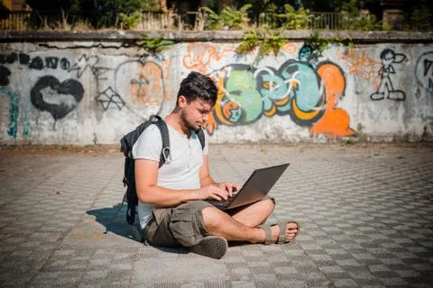 Young stylish man using notebook Stock Photos