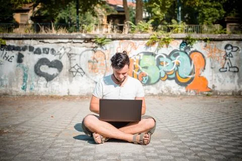 Young stylish man using notebook Stock Photos