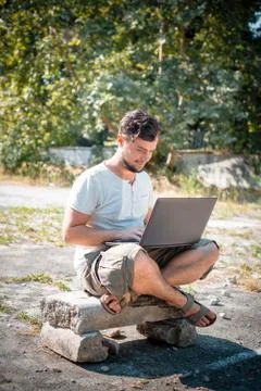 Young stylish man using notebook Stock Photos