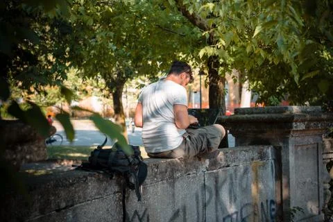 Young stylish man using notebook Stock Photos
