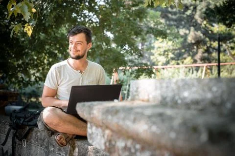 Young stylish man using notebook Stock Photos