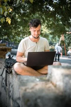 Young stylish man using notebook Stock Photos