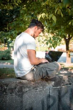 Young stylish man using notebook Stock Photos