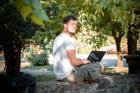 Young stylish man using notebook Stock Photos