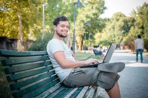 Young stylish man using notebook Stock Photos