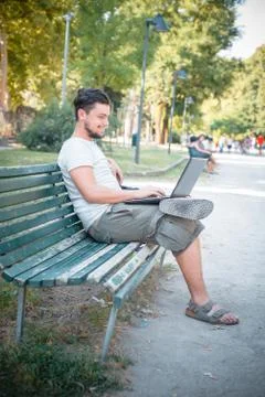 Young stylish man using notebook Stock Photos