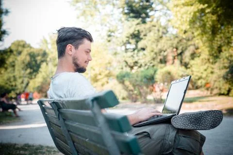 Young stylish man using notebook Stock Photos