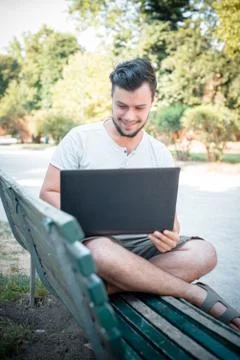 Young stylish man using notebook Stock Photos