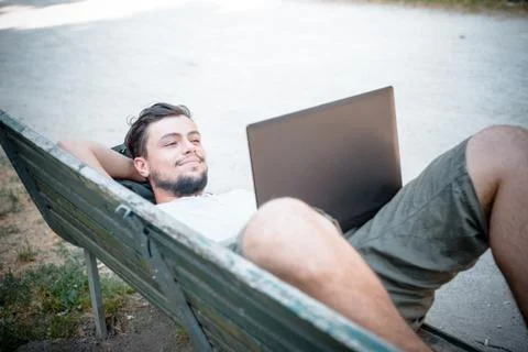 Young stylish man using notebook Stock Photos