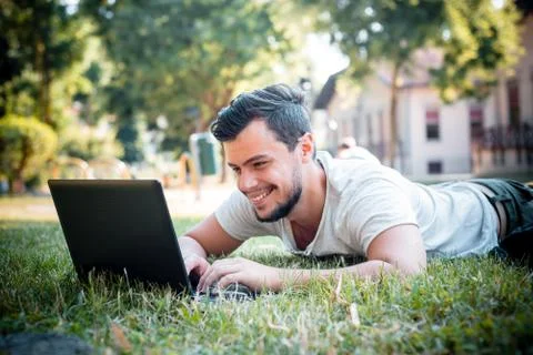 Young stylish man using notebook Stock Photos