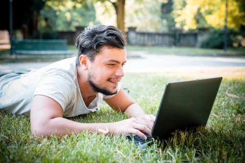 Young stylish man using notebook Foto stock
