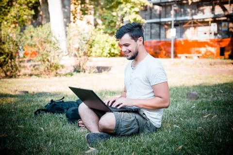 Young stylish man using notebook Stock Photos