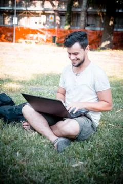Young stylish man using notebook Stock Photos