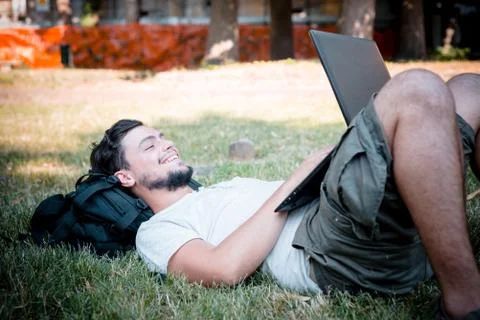 Young stylish man using notebook Stock Photos