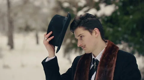 Young Stylish Man Wears a Hat Stock Footage 41495763
