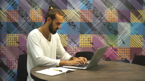 Young stylish man working in cafe with with laptop and notebook diary Stock Footage 67094525