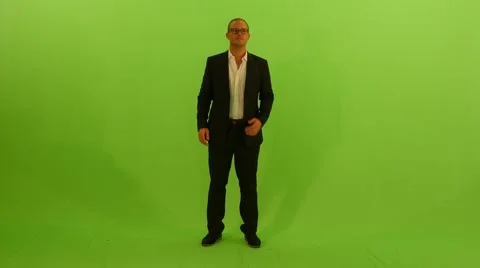 Young successful business man doing a phone call. green screen Video stock 64800671