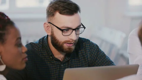Young successful focused Caucasian software developer working behind office Stock Footage 106067875