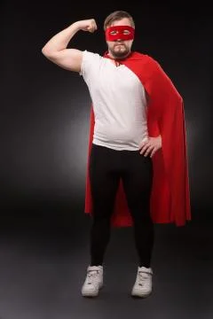 Young super hero man in studio Stock Photos