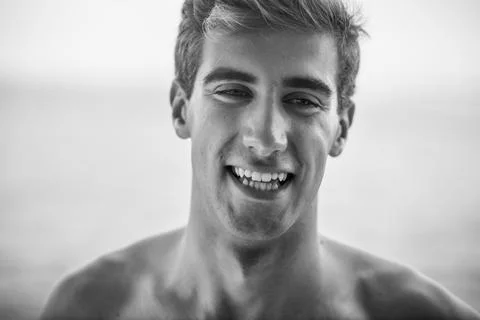 Young surfer smiling Stock Photos