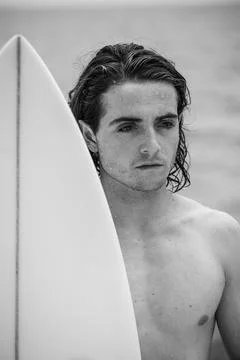 Young surfer with surfboard Stock-Fotos