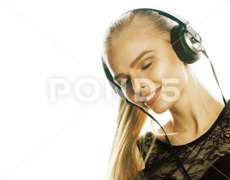 Young sweet talented teenage girl in headphones singing isolated Stock Photos