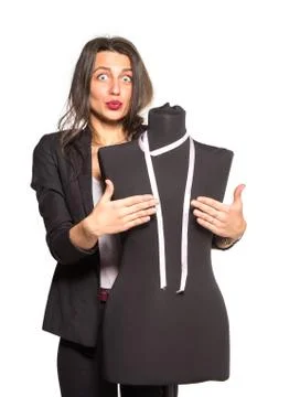 Young tailor posing with mannequin Stock Photos