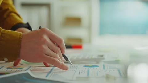 A young talented analyst solves complex analytical problem, looking for the Stock Footage 266801112