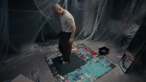 Young Talented Craftsman Imprinting Pattern while Painting on Textile in Studio Stock Footage 301684295