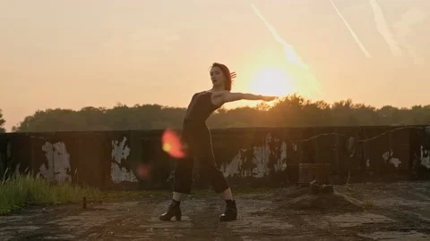 Young talented female dancer performing freestyle moves enjoying modern dance. Video stock 140032549