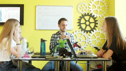 Young teacher and students in robotics class Stock-Footage 140760727