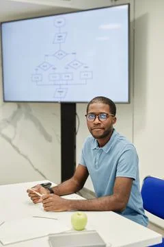 Young Teacher in Class Stockfoto's