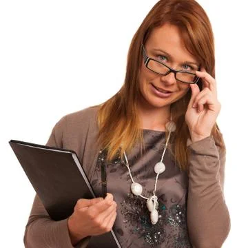 Young teacher with folder in her hands Stock Photos