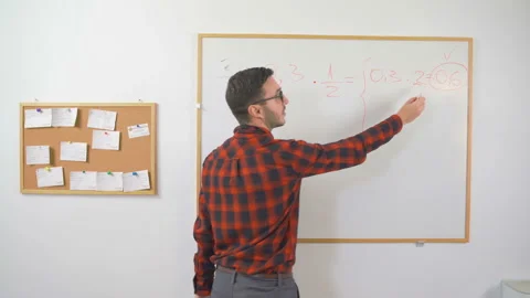 Young teacher working from home teaching online math subject. Stock Footage 140260289