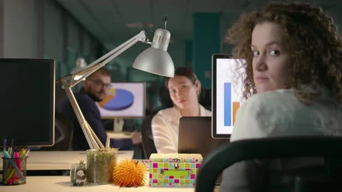 Young Team of Diverse Professionals Working Late in Modern Office Stock-Footage 137519146